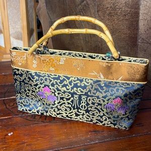 Beautiful silk purse with bamboo handles‎